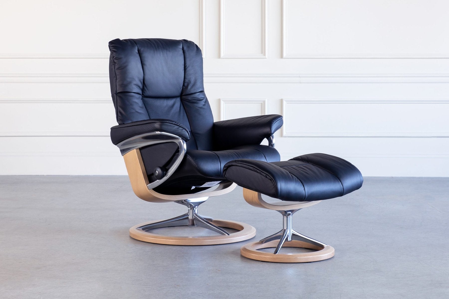 Stressless Mayfair Signature recliner and ottoman in Paloma Oxford Blue leather