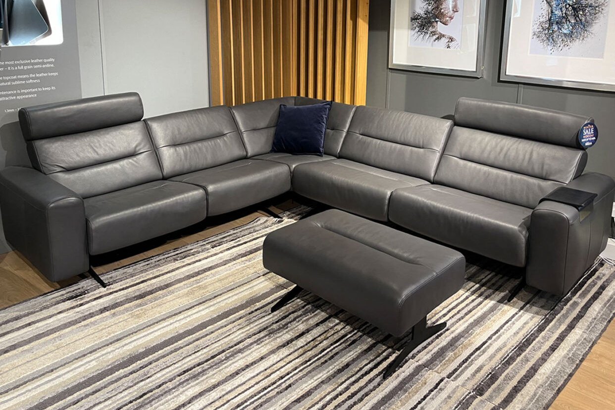 Stressless Stella sectional sofa and ottoman in grey leather
