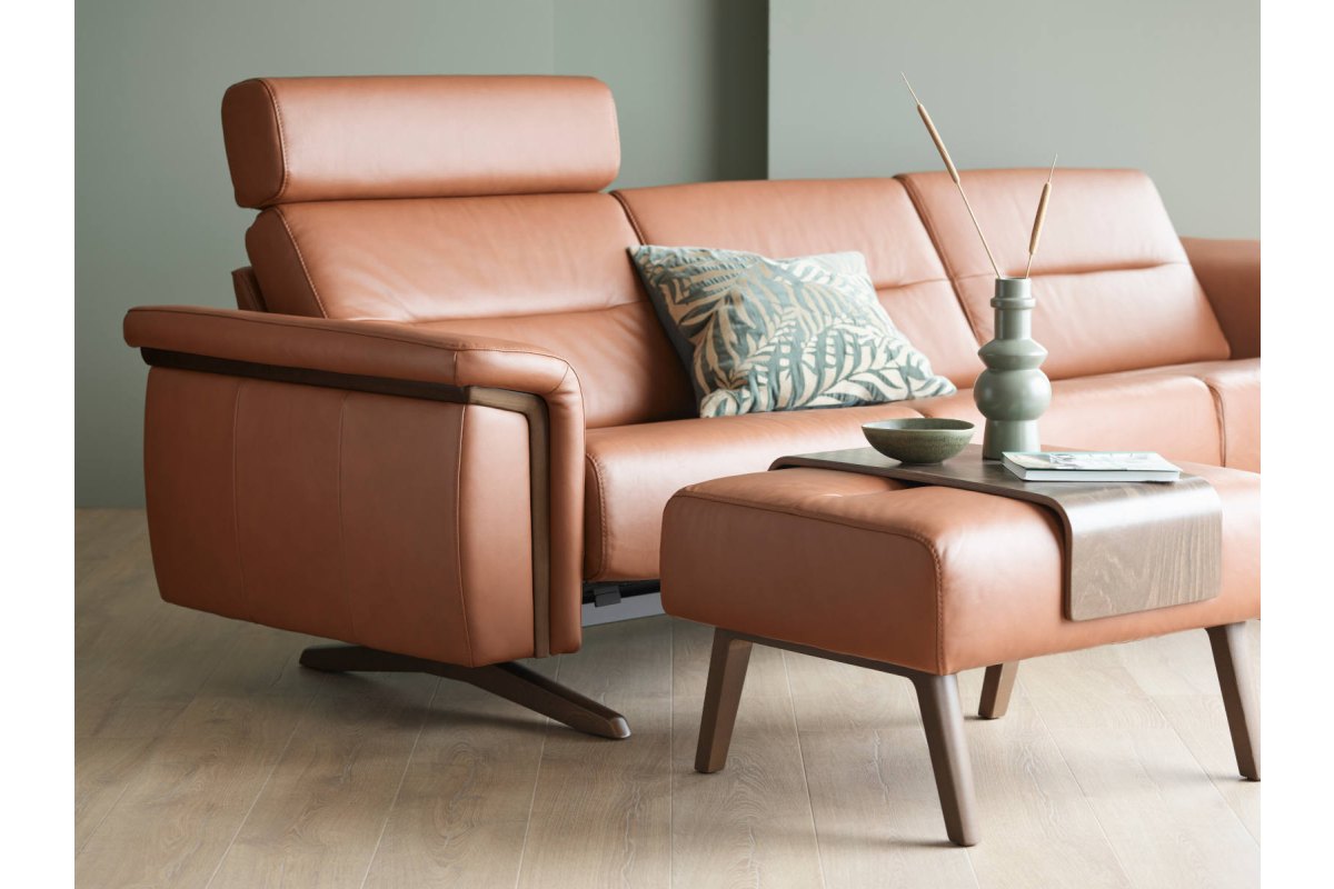 Stressless Stella sofa and ottoman in New Cognac leather