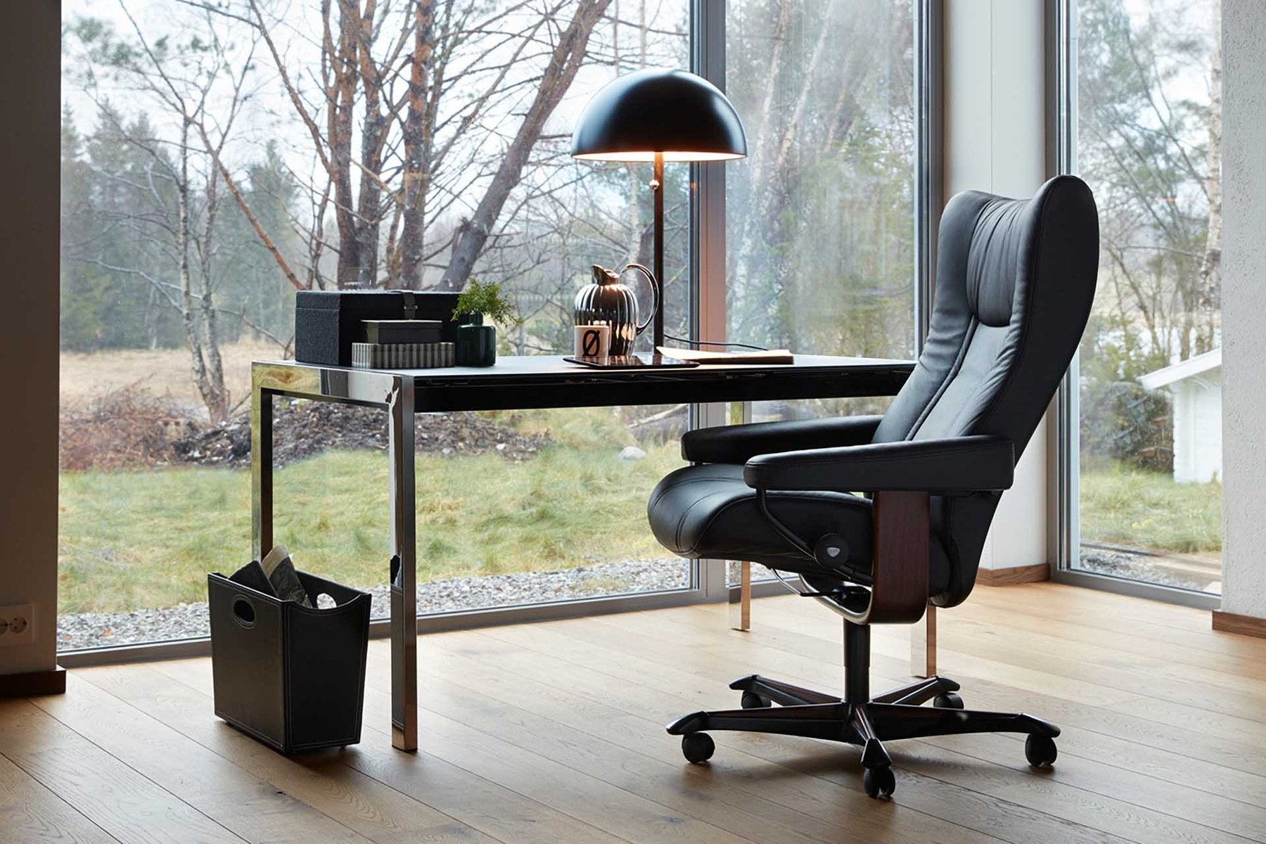 Stressless Wing office chair at a desk in a modern home office with garden views