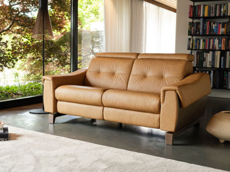 Stressless® Anna Loveseat with A3 wood-panel arms in a library setting
