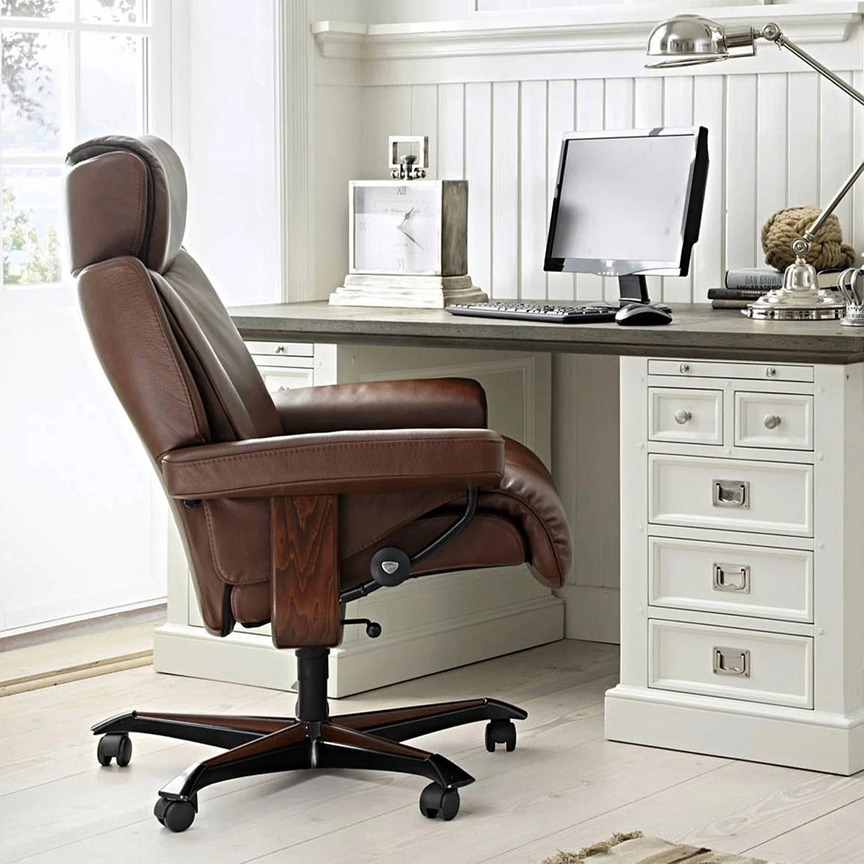 Stressless Magic home office chair in brown leather at a white home office desk