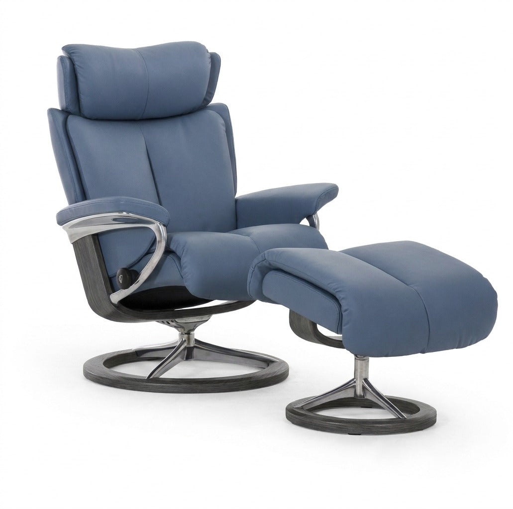 Stressless Magic Signature Medium recliner and ottoman in Paloma Sparrow Blue leather with a Grey stain Signature base, in-stock floor model at Haynes Comfort.