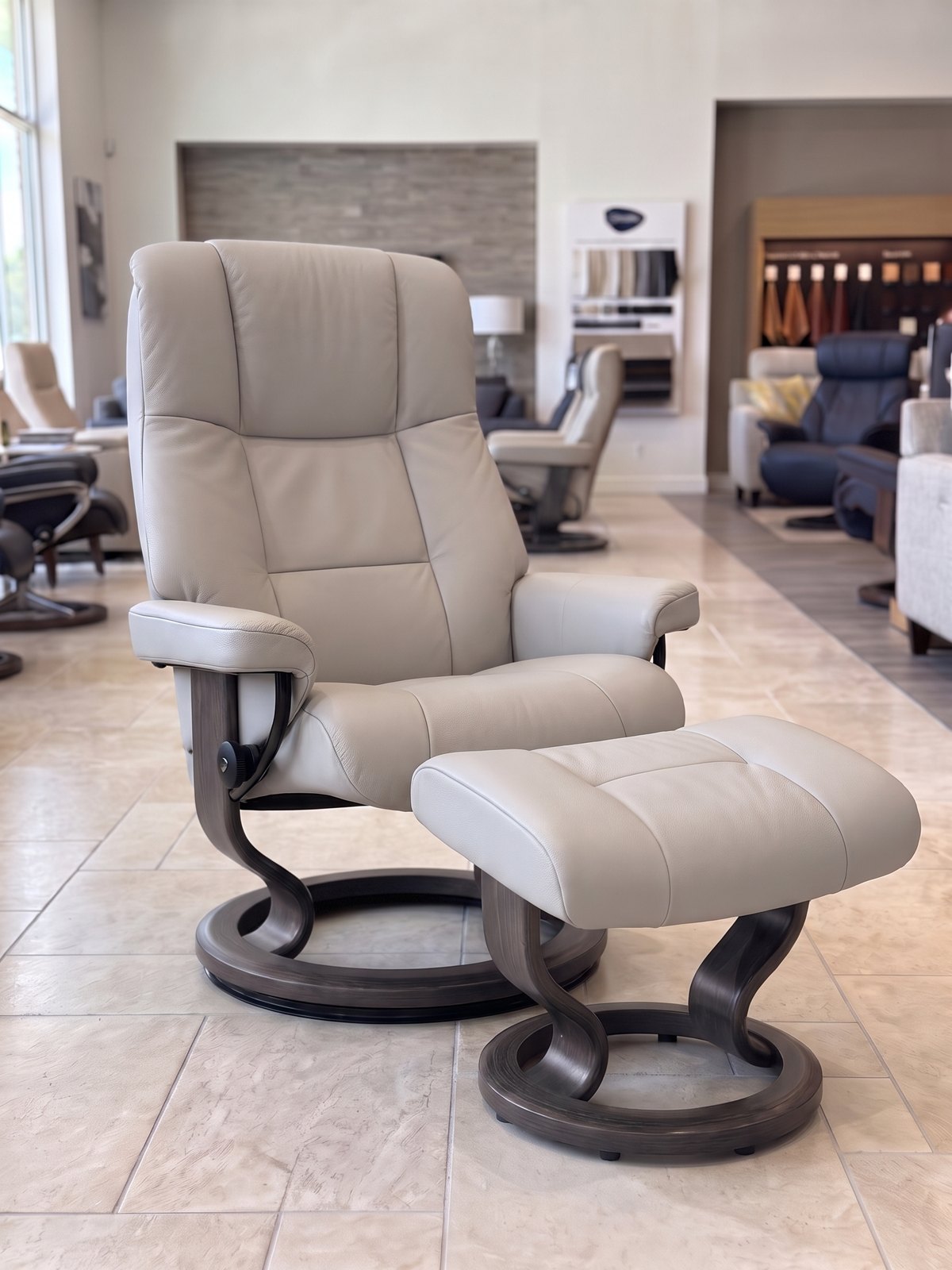 Stressless Mayfair Large Classic recliner and ottoman in Paloma Light Grey leather with a Grey stain Classic base, In-Stock Special at Haynes Comfort