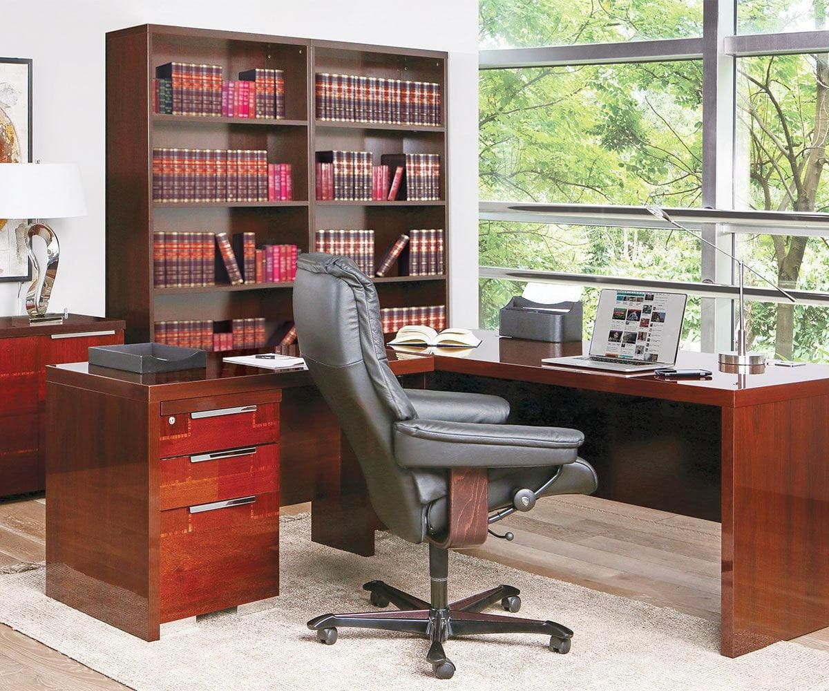 Stressless Mayfair home office chair in black leather at a cherry wood desk