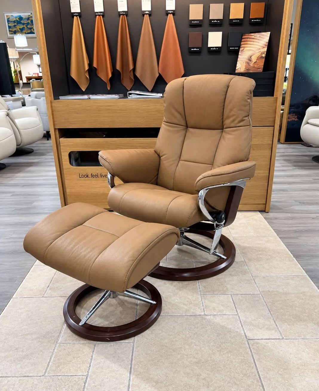 The Stressless Mayfair Small Signature recliner in Paloma Taupe leather, in stock at Haynes Comfort.