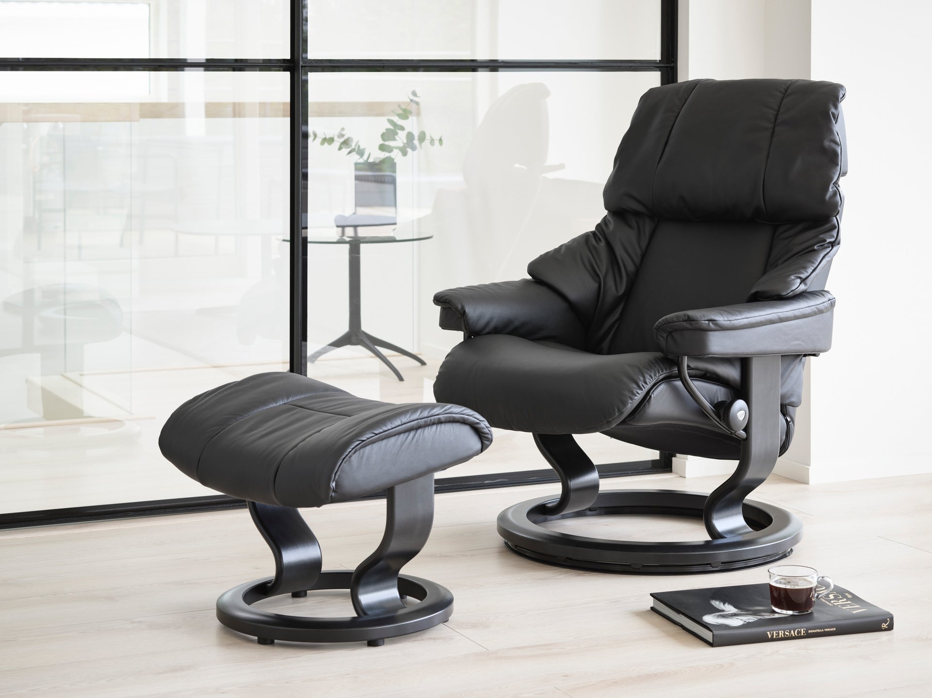 The Stressless Reno Classic recliner in Paloma Black leather.