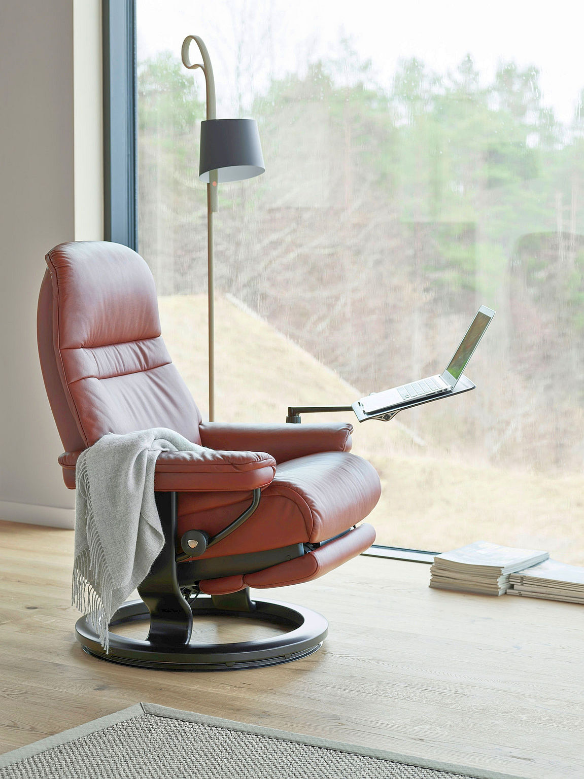 The Stressless Sunrise Power recliner with Wenge wood.