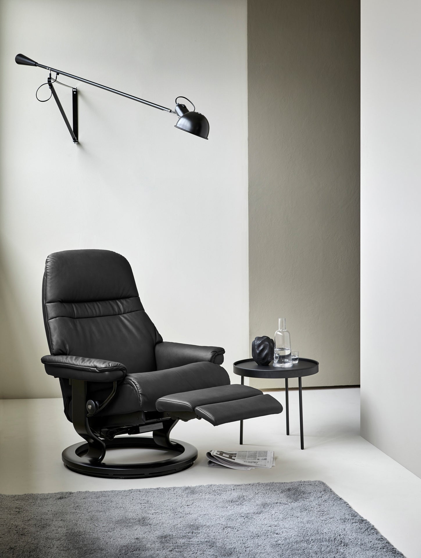 The Stressless Sunrise Power recliner in Paloma Black leather.